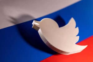 illustration shows twitter logo and russian flag